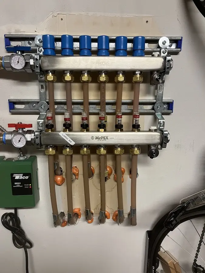 Plumber performing Gas Line Installation at a residential property in Woodstock